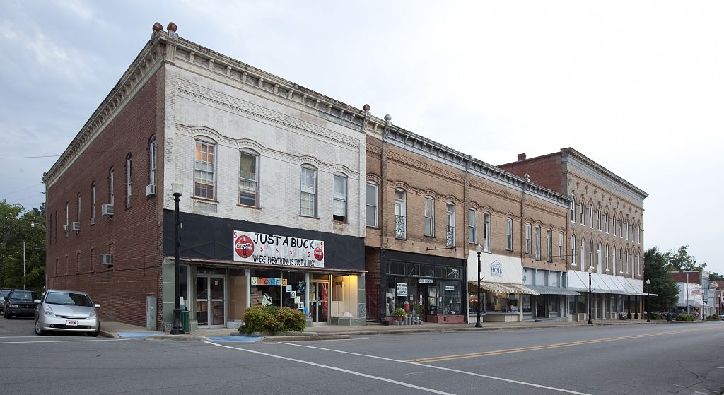 Historic brick storefronts in downtown Greensboro, Alabama